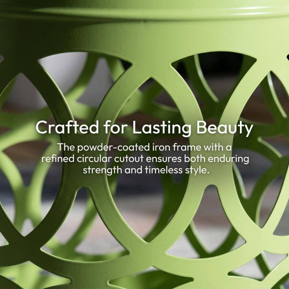 Close-up of the green powder-coated iron frame with circular cutouts.