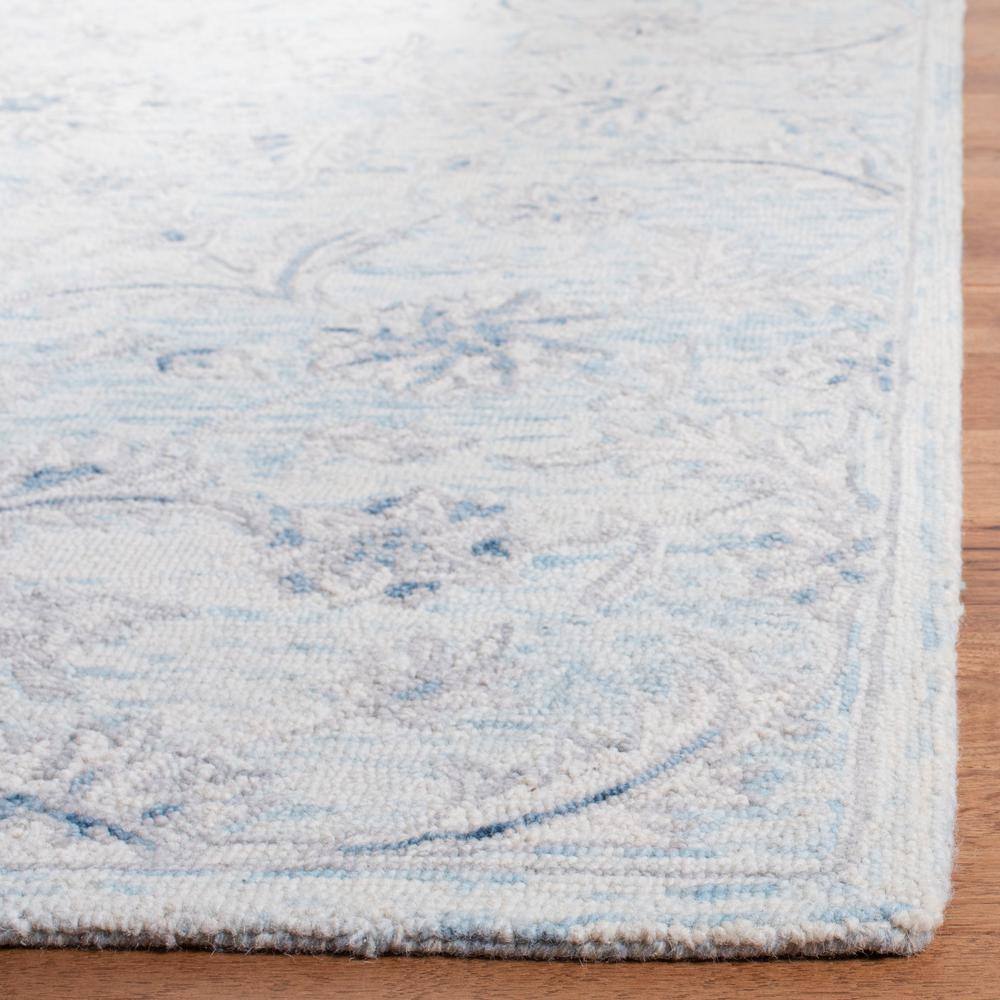 Elysian Bliss Light Blue/Ivory Hand-Tufted Wool Round Rug