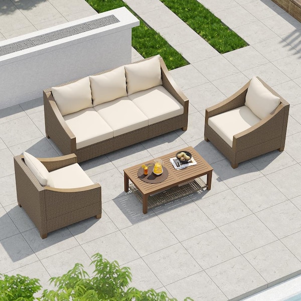 Zeus & Ruta 4-Piece Brown Rattan Patio Outdoor Conversation Set with Beige Cushions and 1 Wooden Coffee Table