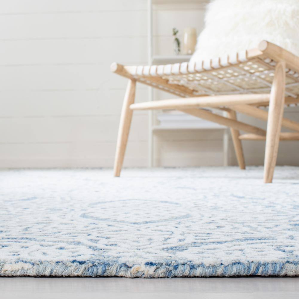 Blue and Ivory Hand-Tufted Wool 8' x 10' Area Rug