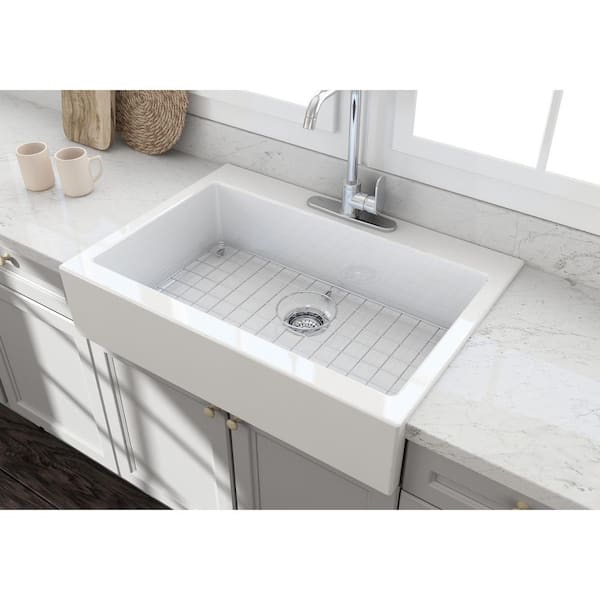 34 in. Farmhouse/Apron-Front Single Bowl White Fireclay Kitchen Sink with Bottom Grid