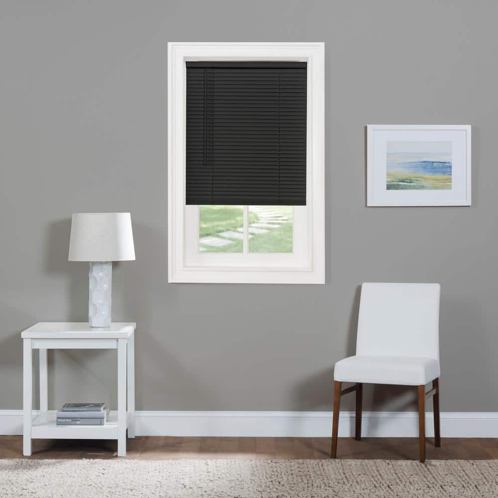 https://images.thdstatic.com/productImages/7442d178-4213-4f87-828c-62cbba341ed5/svn/black-achim-vinyl-mini-blinds-msg226bk06-64_1000.jpg