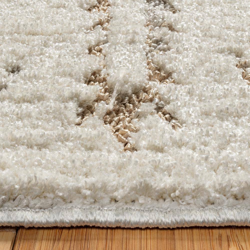 Joeri Cream Tufted Rectangular 5' x 7' Synthetic Area Rug