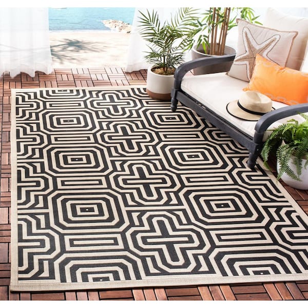 Courtyard Sand/Black 5 ft. x 8 ft. Border Indoor/Outdoor Patio  Area Rug