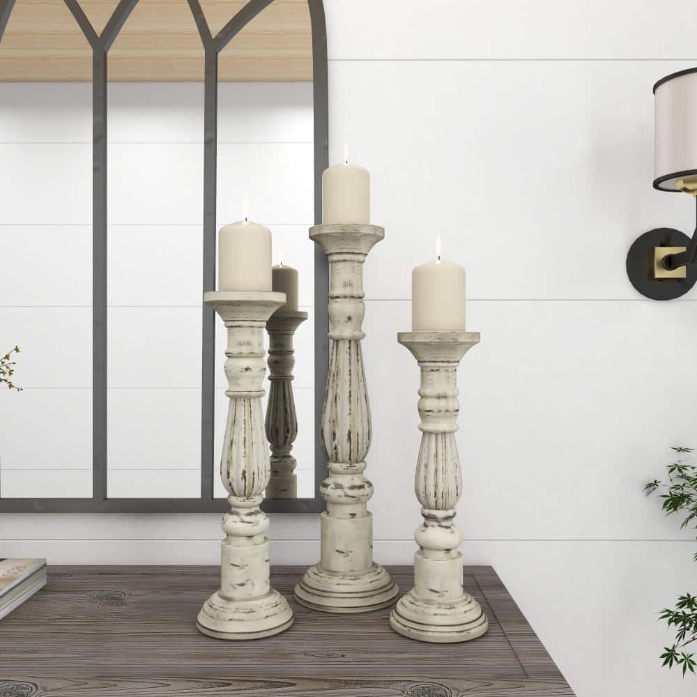 Distressed White Mango Wood Candle Holder Set, 21" 17" 15"