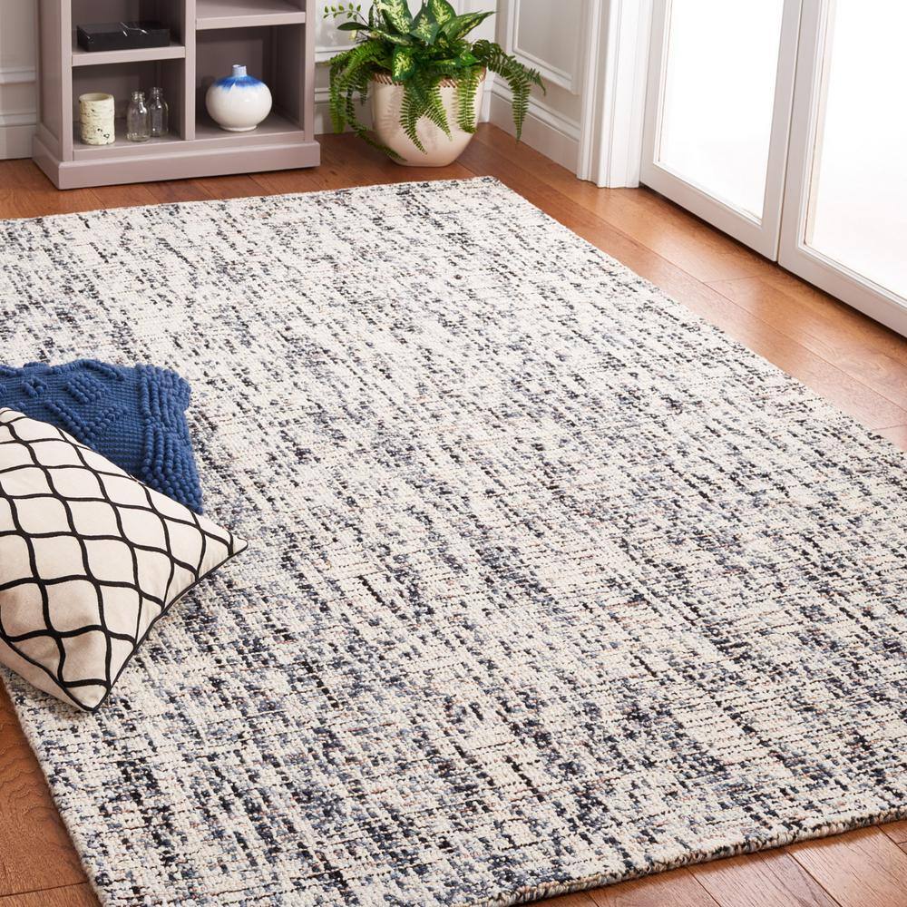 Handmade Black and Beige Abstract Wool Area Rug, 4' x 6'