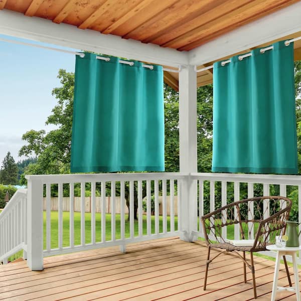 EXCLUSIVE HOME Cabana Teal Solid Polyester 54 in. W x 63 in. L Grommet Top Light Filterin.g Curtain. Panel (Double Panel)
