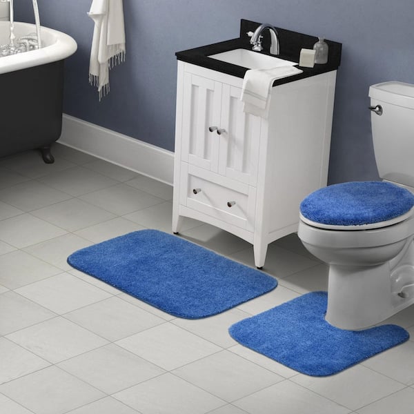 https://images.thdstatic.com/productImages/748ca0bc-4389-4563-ad7c-c5794ee2786e/svn/electric-blue-garland-rug-bathroom-rugs-bath-mats-ba010w3p02ff2-31_600.jpg
