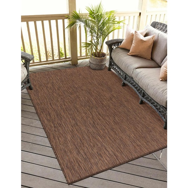 https://images.thdstatic.com/productImages/7497ffdc-de56-471e-90ad-0fa1013e49d4/svn/gold-outdoor-rugs-hd-alh60153-5x7-44_600.jpg