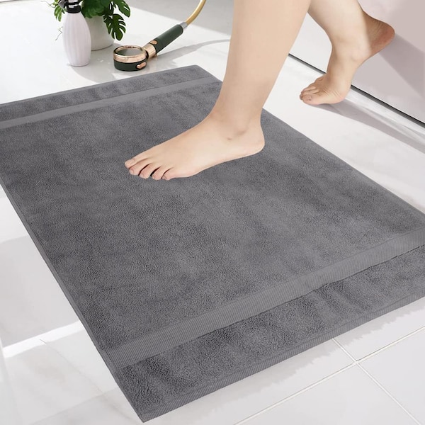 https://images.thdstatic.com/productImages/749f2306-aeee-4c5e-b77a-85ee39c018ca/svn/sharkskin-grey-a1-home-collections-bathroom-rugs-bath-mats-a1hcbm-greynw-4f_600.jpg