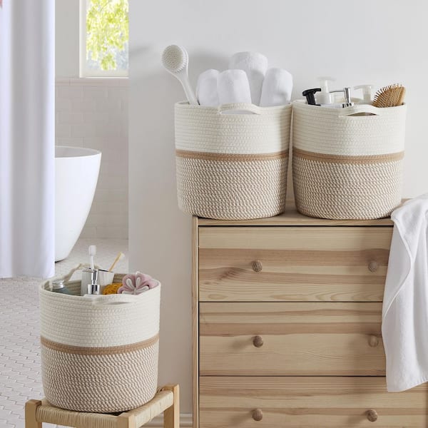 https://images.thdstatic.com/productImages/74a0d482-ed7a-4896-8476-8d21be5a748d/svn/white-brown-storage-baskets-3pk-cot-rope-11x11-white-brown-c3_600.jpg