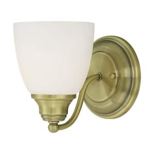 Beaumont 5.375 in. 1-Light Antique Brass Wall Sconce with Satin Opal White Glass