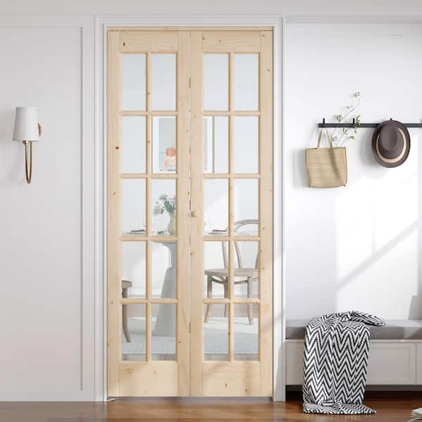 36 in. x 80 in. Pre Assembled Clear Glass Solid Core Wood Spruce Bi-fold Door with Hardware