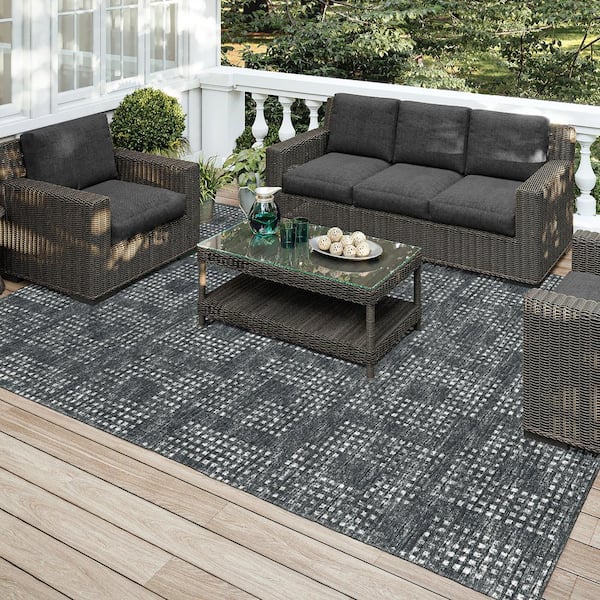 https://images.thdstatic.com/productImages/74c438cf-ca56-5d6e-ba42-1f66384e3578/svn/black-addison-rugs-area-rugs-aer31bk8x10-fa_600.jpg