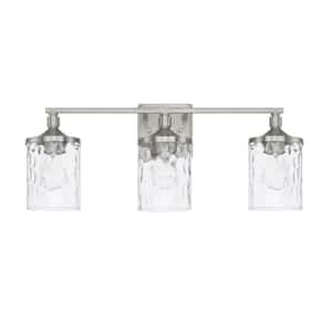 24 in. W x 10 in. H x 7 in. E 3-Light Clear Water Glass Vanity Light in Brushed Nickel