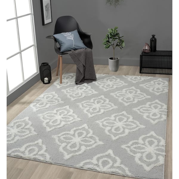 https://images.thdstatic.com/productImages/74d55f75-e8c6-4838-80d9-afc3b35c8e6f/svn/grey-united-weavers-area-rugs-2615-30290-1013-e1_600.jpg