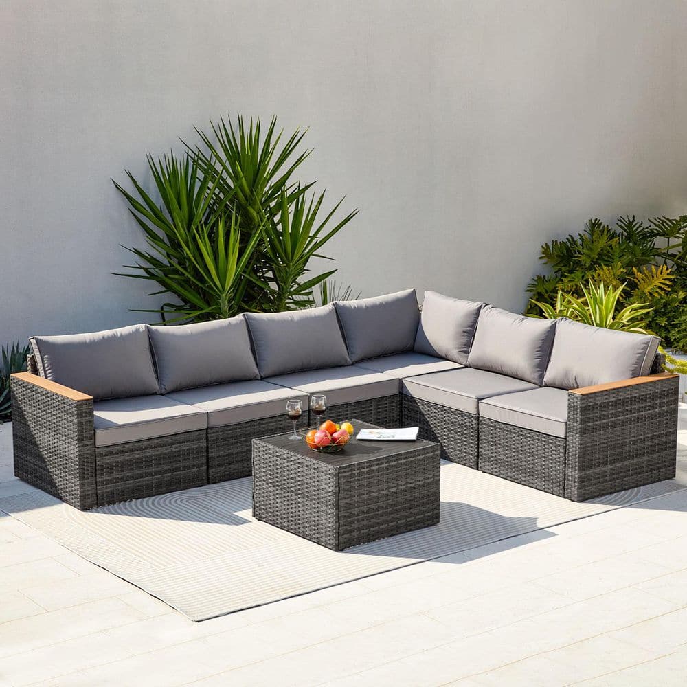 Grey 7-Piece Wicker Outdoor Sectional Set with Light Grey Cushions and Tabl