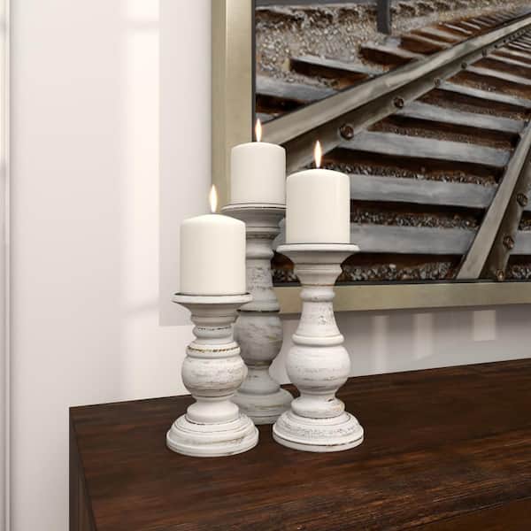 Deco 79 Set Of 3 Mango Wood Pillar Candle Holders - Silver Finish, Traditional Style, 10", 8", 6" Heights