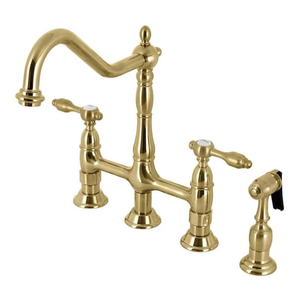 Kingston Brass Tudor Double Handle Deck Mount Gooseneck Bridge Kitchen Faucet with Brass Sprayer in Brushed Brass