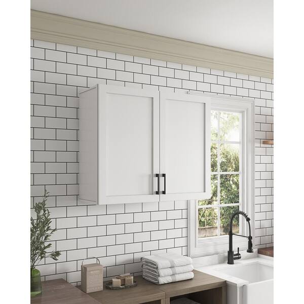 https://images.thdstatic.com/productImages/751c2918-183b-41f5-8af8-310617dd83ce/svn/white-2-pack-ove-decors-bathroom-wall-cabinets-15kwcr-caby36-0-40_600.jpg