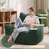 Woman demonstrating lumbar and neck support on the bean bag chair.