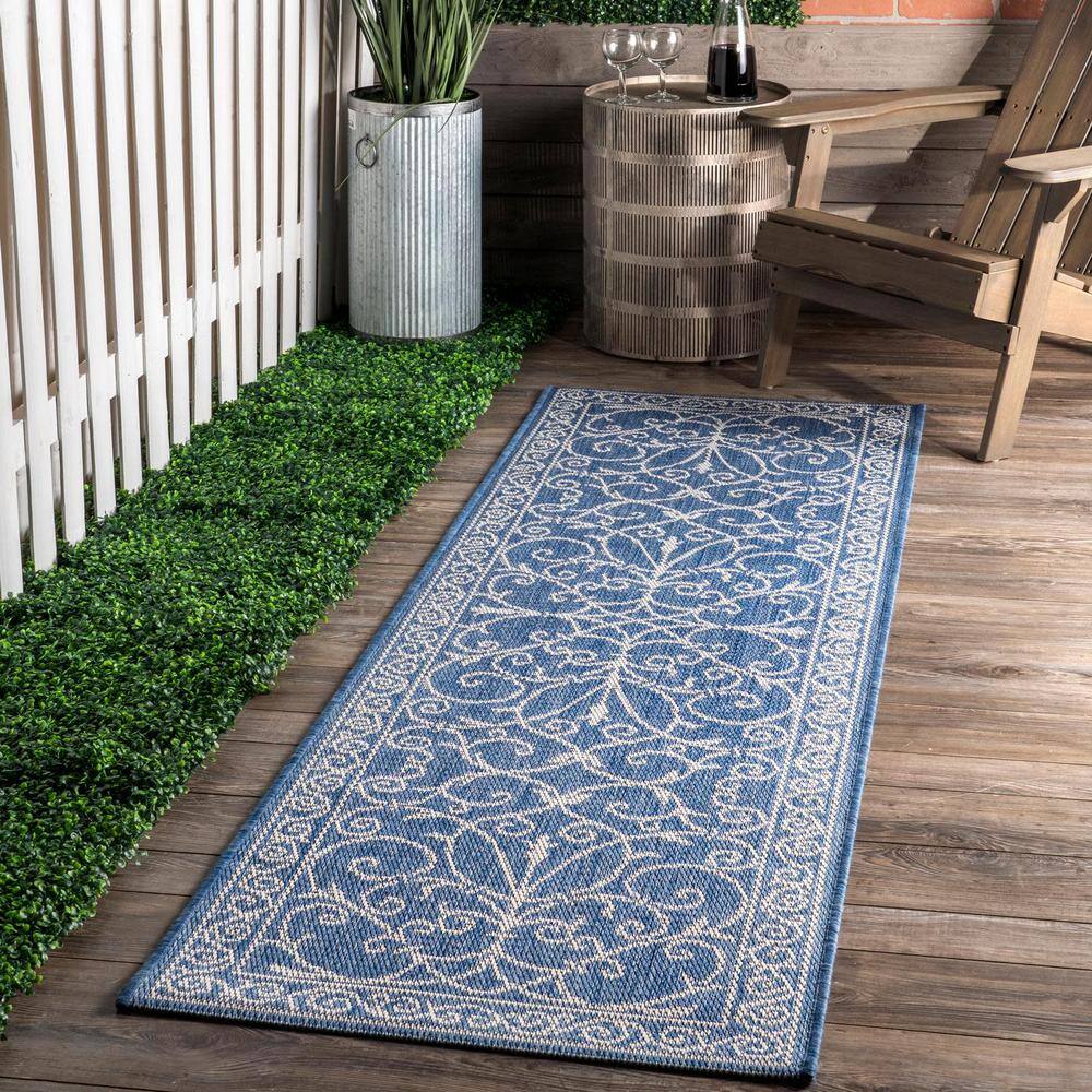 Kathleen Blue and White Synthetic 6' x 9' Rectangular Area Rug
