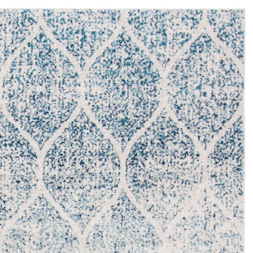 Elegant Cream & Turquoise Synthetic 8'x10' Reversible Area Rug