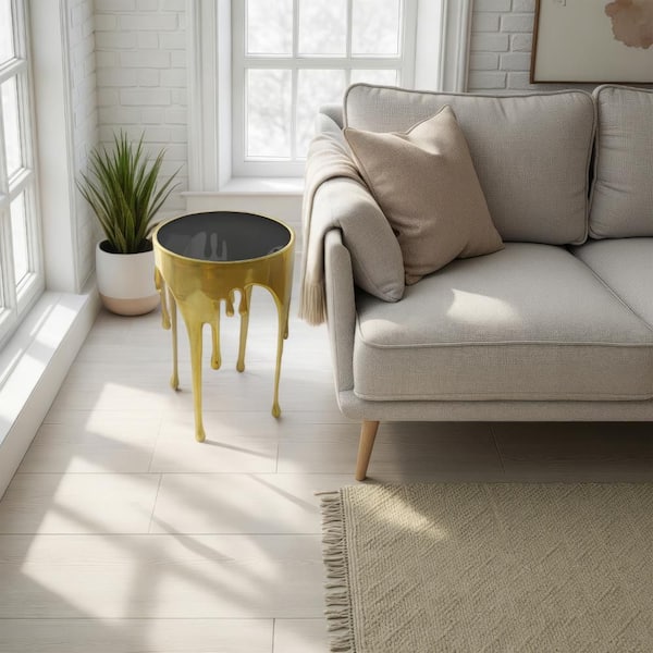 Capri 15.5 in. Antique Gold and Black Round Glass Top End Table with Melting Drip Design