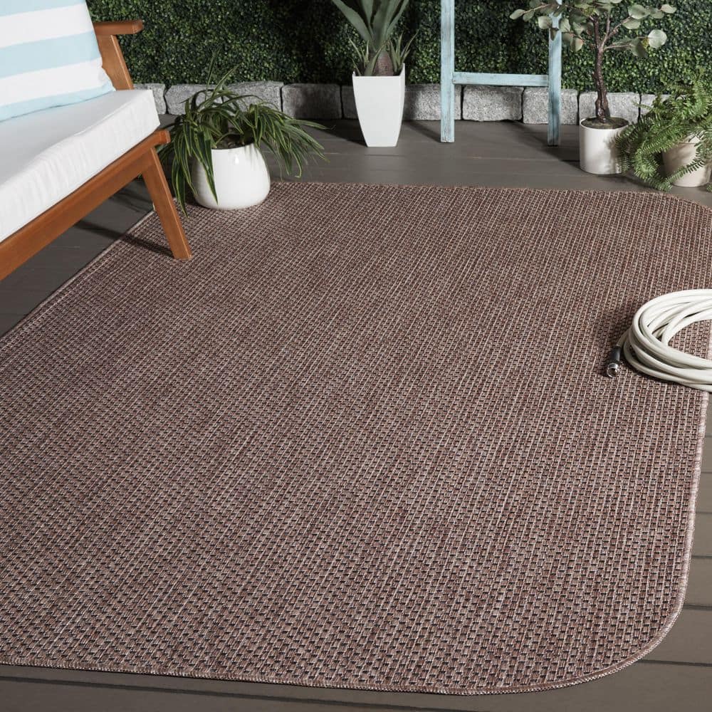 Courtyard 5 ft. x 8 ft. Natural/Black Solid Color Area Rug price history on PriceWatchPro