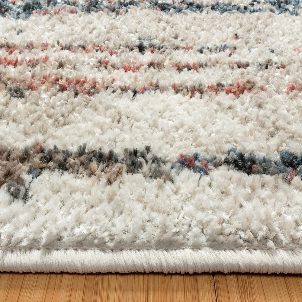 Ivory Tufted Synthetic 5' x 7' Rectangular Area Rug