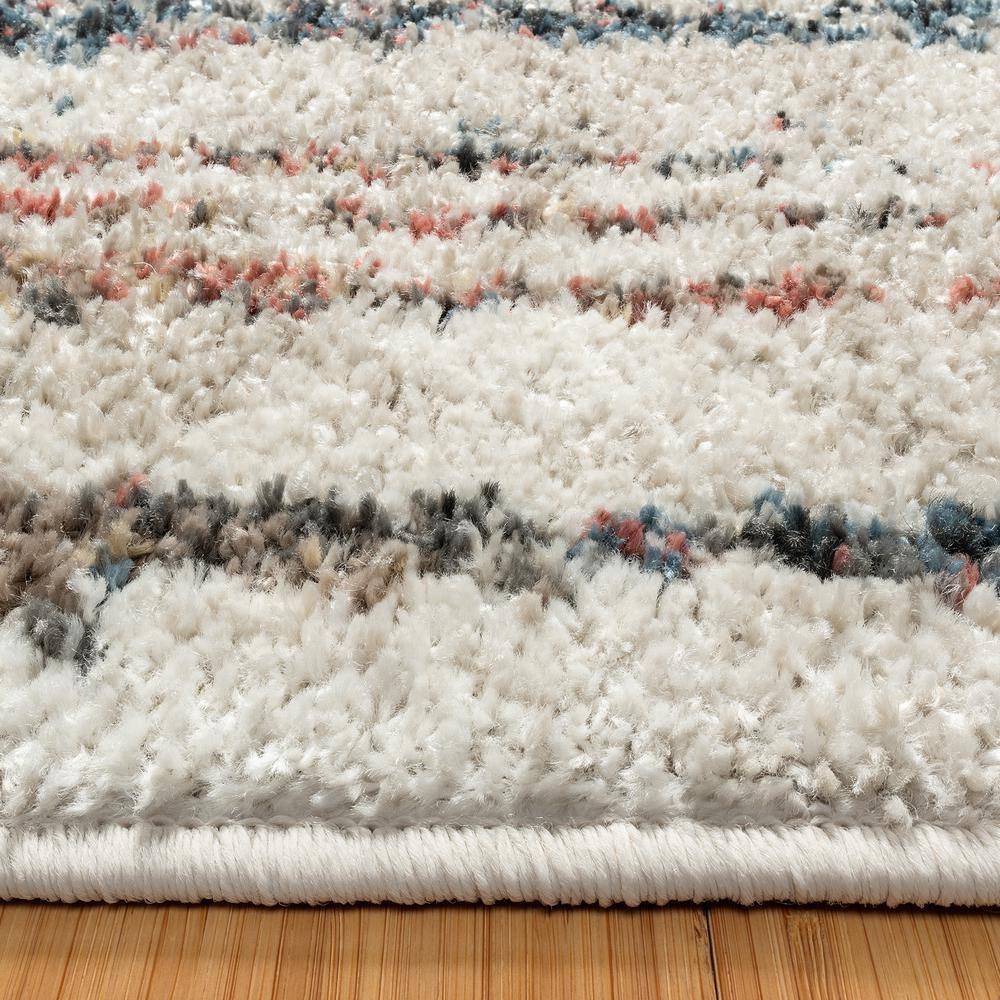 Ivory and Multicolor Tufted Synthetic Area Rug 8'9" x 13'