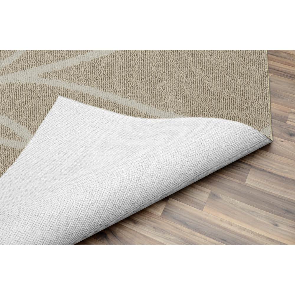 Tan and Ivory Floral Tufted Synthetic 5' x 7' Area Rug