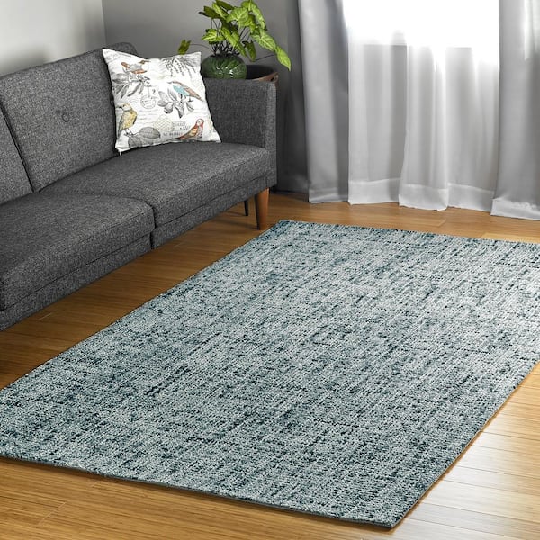 https://images.thdstatic.com/productImages/75b76e47-7fef-4d18-8e24-efd16890753b/svn/graphite-kaleen-area-rugs-lco01-68-576-31_600.jpg