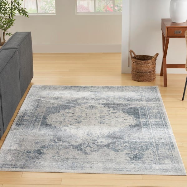 Astra Machine Washable Blue Ivory 5 ft. x 7 ft. Distressed Traditional Area Rug