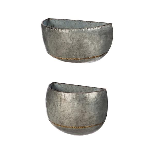 https://images.thdstatic.com/productImages/75cee1ca-a60c-4ce1-95ef-063d539fbe21/svn/silver-evergreen-wall-planters-8pmtl053-64_600.jpg