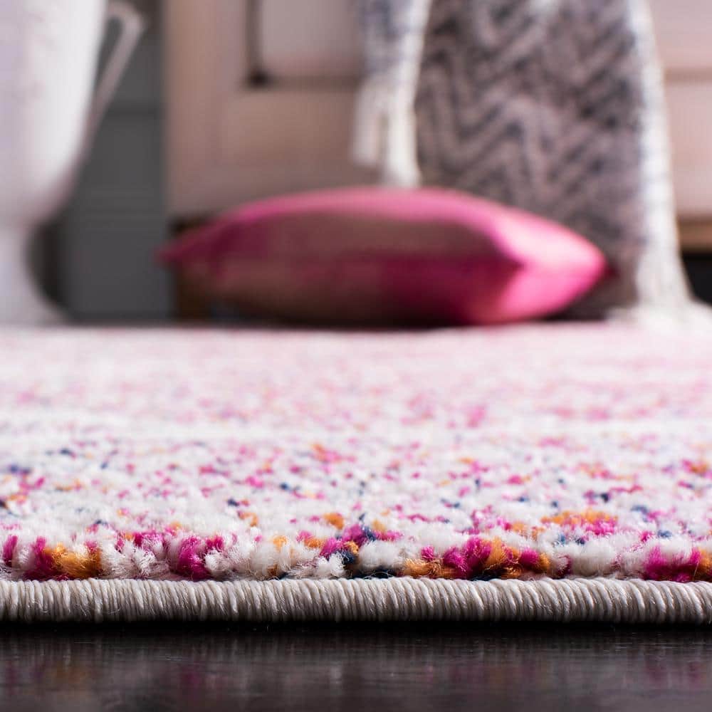 Cream and Fuchsia Reversible Synthetic Area Rug
