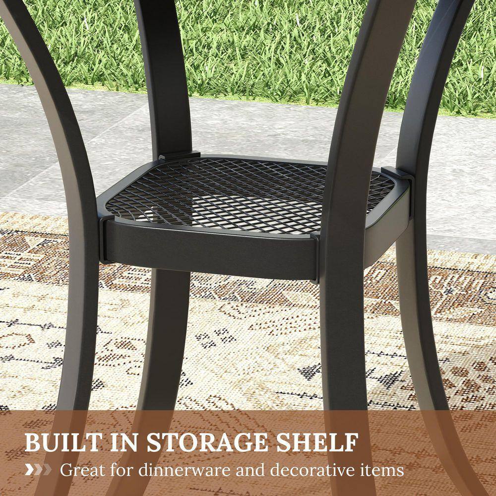 Close-up of the mesh storage shelf underneath the black metal dining table.
