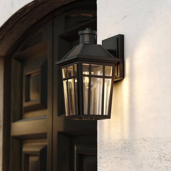 Garfield Park 12.25 in. H 1-Light Textured Black Indoor/Outdoor Wall Sconce, Aluminum, Clear Seeded Glass Shade