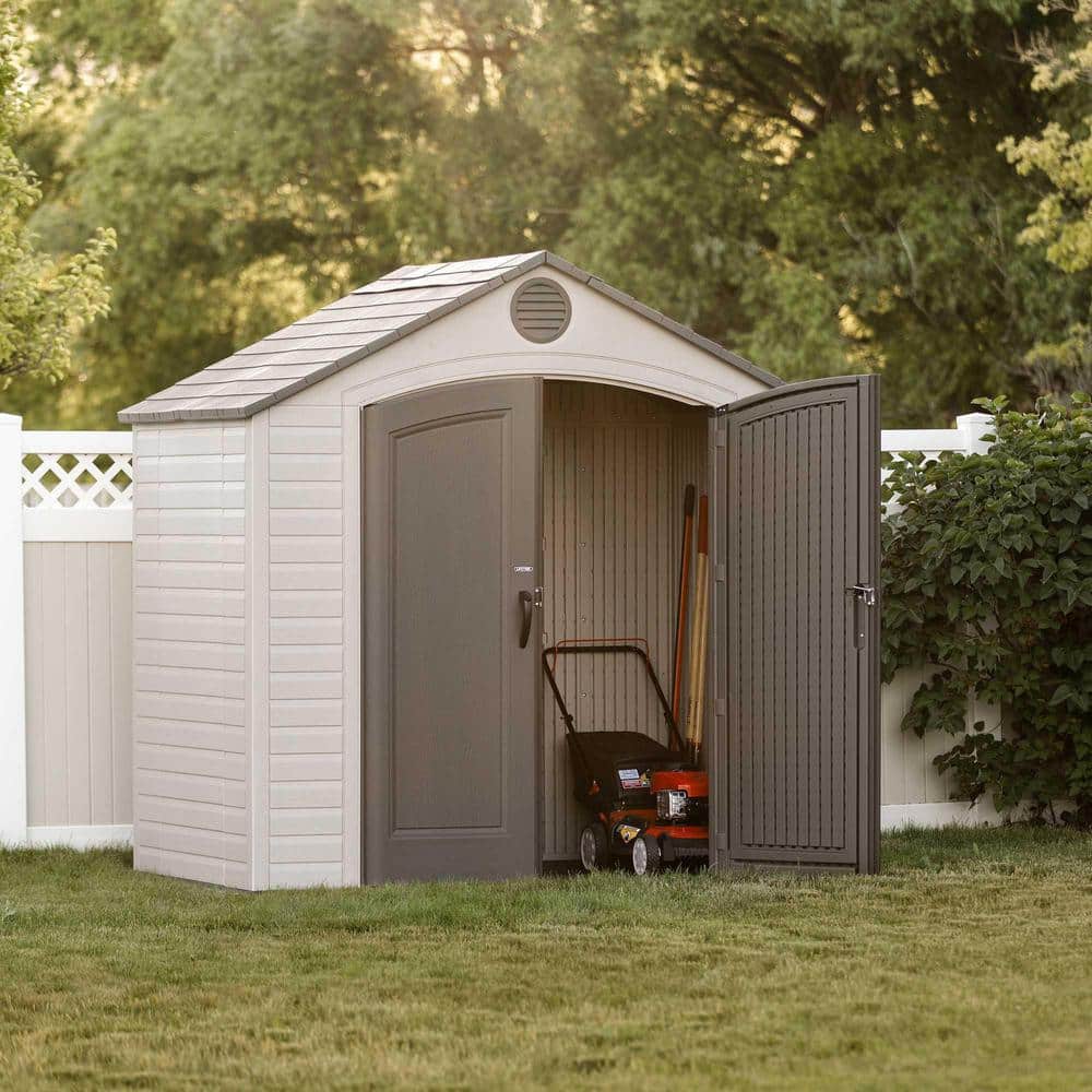Beige and Brown Polyethylene Outdoor Storage Shed with Windows