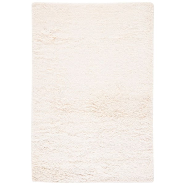 Casablanca 4 ft. x 6 ft. Ivory Flokati Solid Color Area Rug