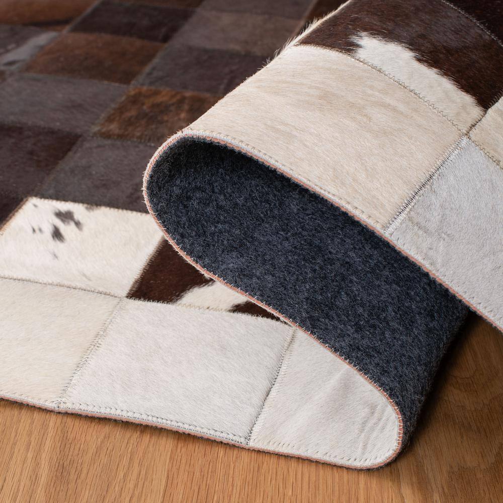 Artisan Ivory Geometric Hand-Stitched Cowhide 5' x 8' Area Rug