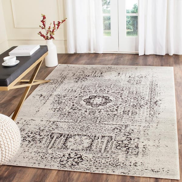 Evoke Ivory/Black 10 ft. x 14 ft. Distressed Medallion Area Rug