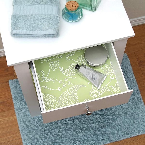https://images.thdstatic.com/productImages/7635132f-8f6f-4996-b215-a29402642b17/svn/lime-green-and-white-magic-cover-shelf-liners-drawer-liners-16f-18407-06-c3_600.jpg