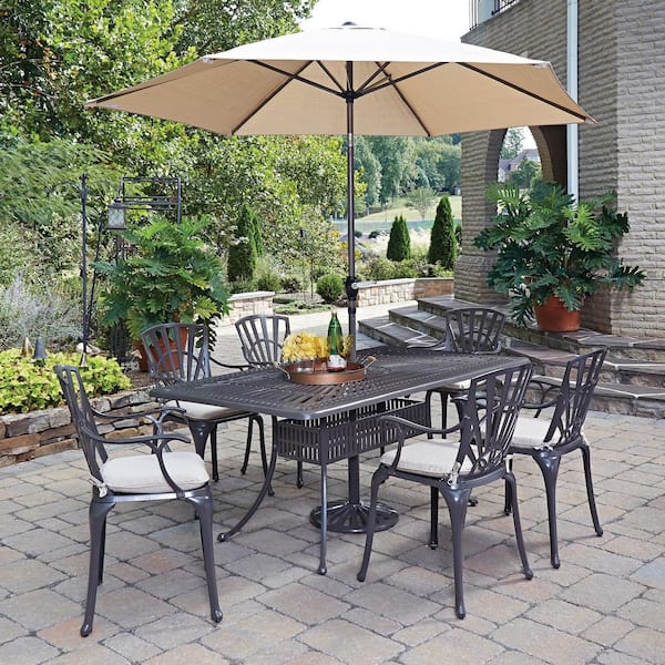 HOMESTYLES Grenada Taupe Tan 7-Piece Cast Aluminum Rectangular Outdoor Dining Set with Umbrella with Natural Tan Cushions