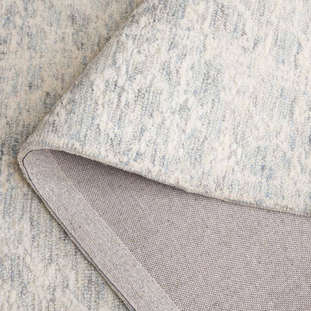 Ivory Hand Tufted Wool 4' x 6' Area Rug