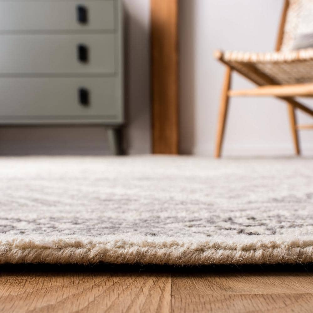 Ivory and Light Brown Geometric Wool 4' x 6' Handmade Tufted Rug