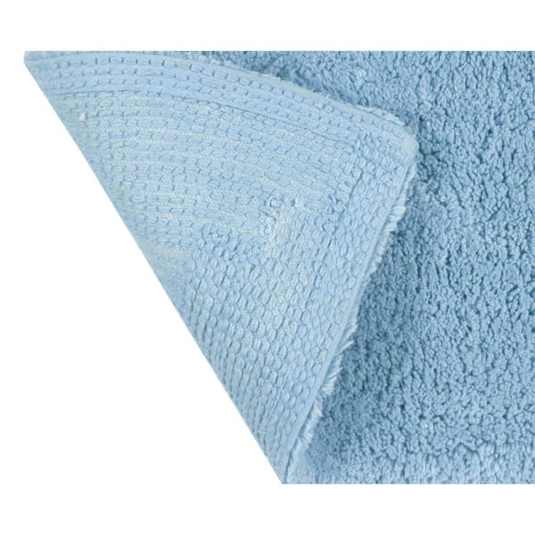 https://images.thdstatic.com/productImages/76716ec1-72c2-4522-81b5-13e6f965088a/svn/blue-bathroom-rugs-bath-mats-bwa2260bl-31_600.jpg