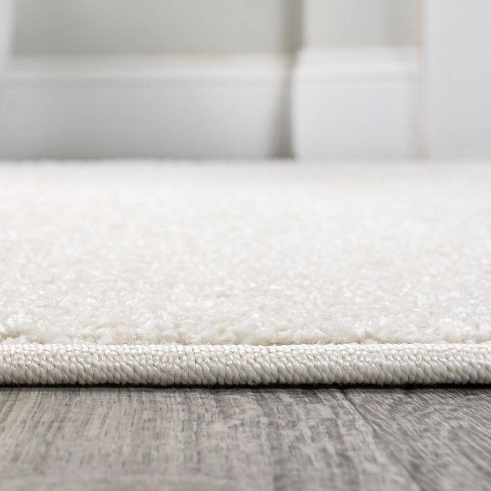 Cream Solid Low-Pile Synthetic 3' x 5' Area Rug