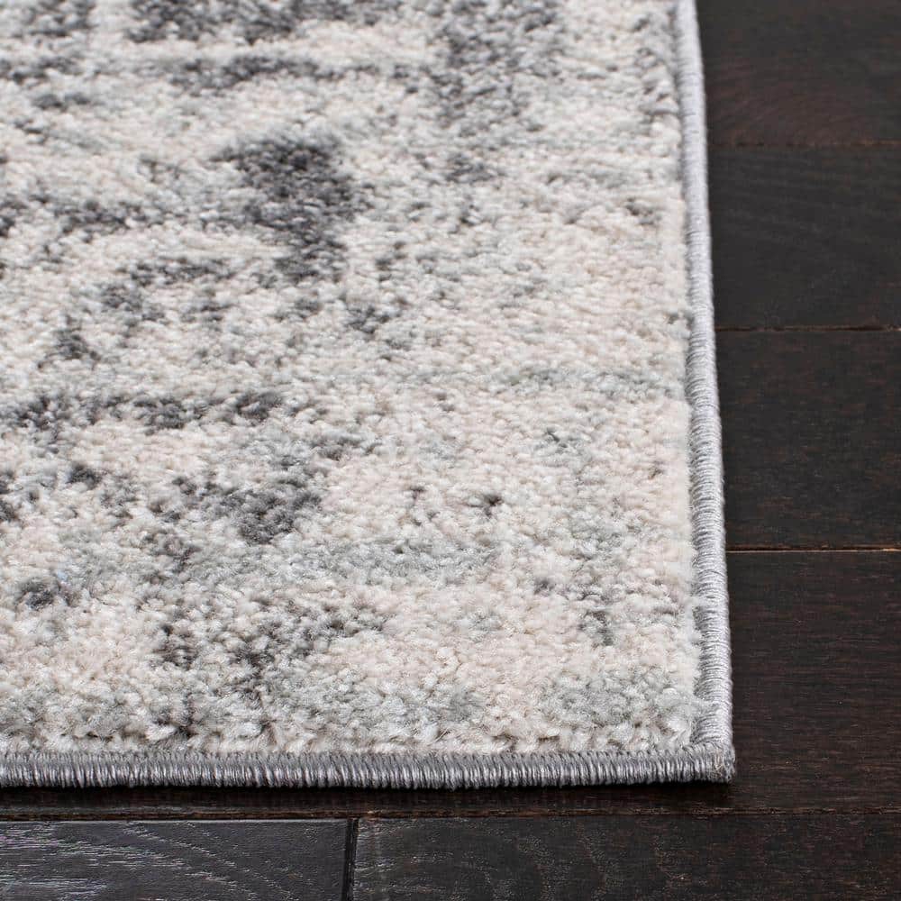Ivory Abstract 4' x 6' Reversible Synthetic Area Rug