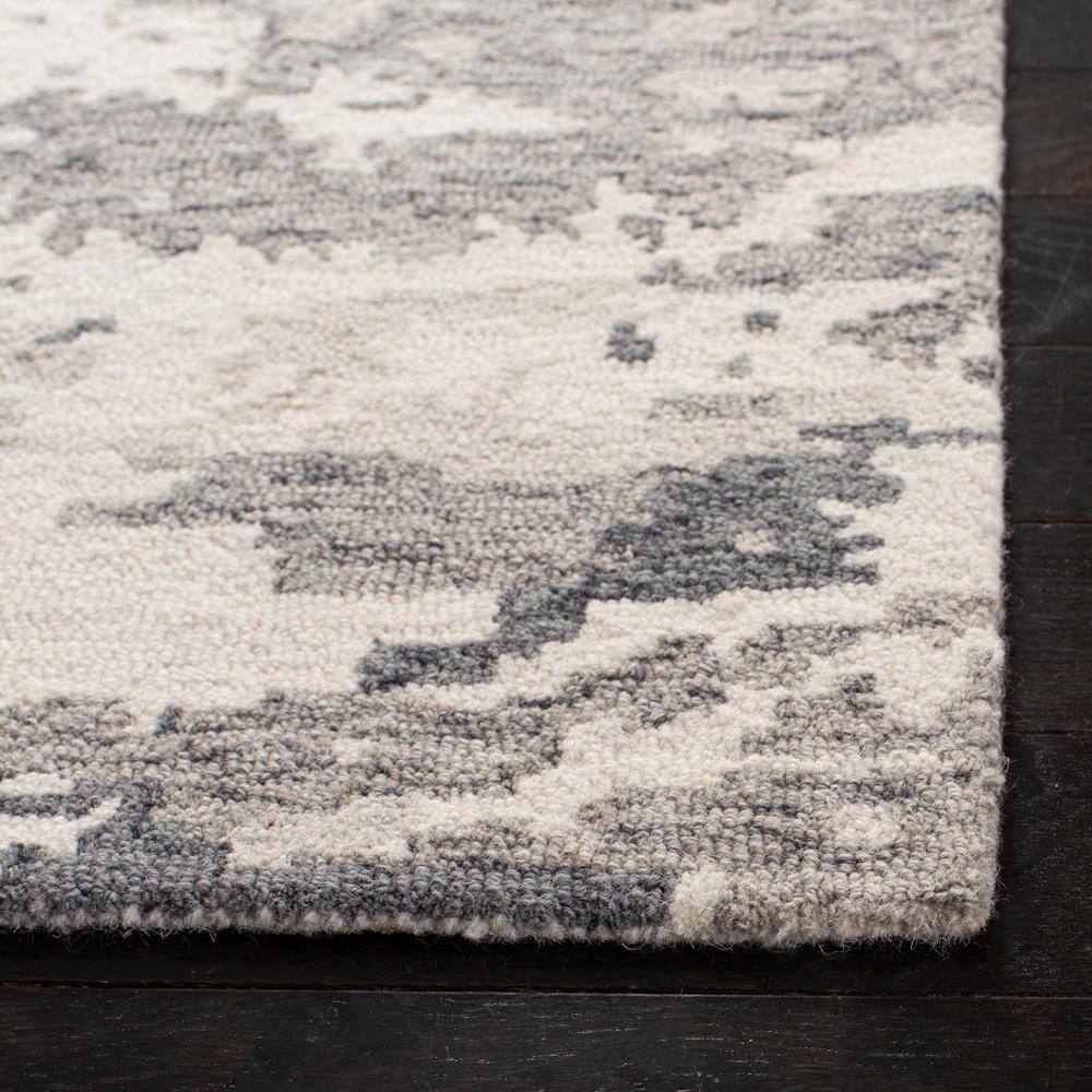 Handmade Charcoal and Ivory Wool 9' x 12' Abstract Tufted Rug